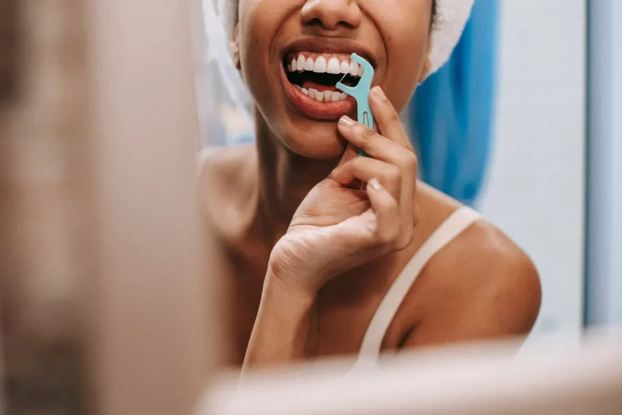 Como usar o fio dentário: Um guia completo para dentes saudáveis