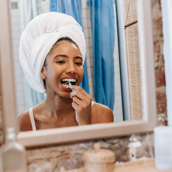 3 razões pelas quais os meus dentes doem depois de usar o fio dental